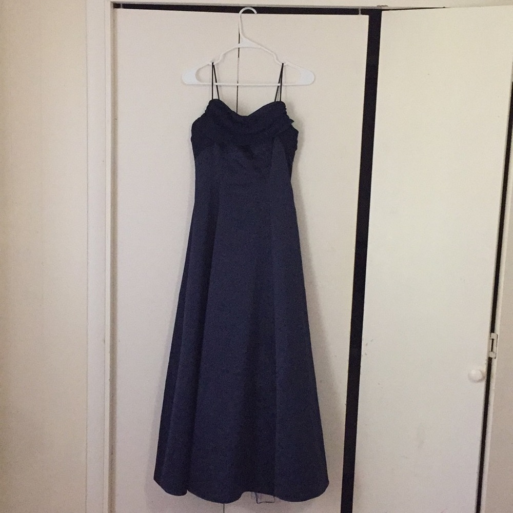 Graciously and gorgeous dress.